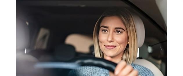 Kvinna som kör bil, Avis pressbild
