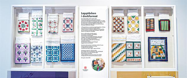 Lapptäcken i dockformat.