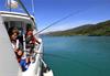 Two children fishing from Pilagutt in the Hardangerfjord – a perfect family activity in stunning nature.